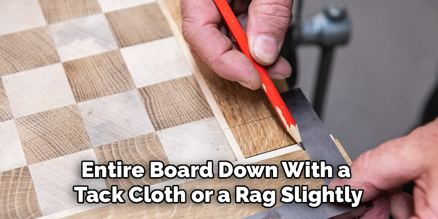 Entire Board Down With a 
Tack Cloth or a Rag Slightly