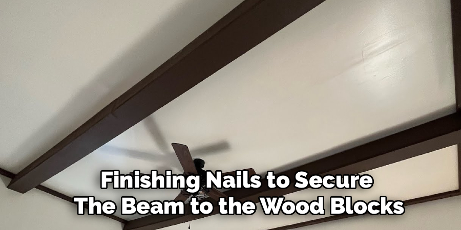 Finishing Nails to Secure 
The Beam to the Wood Blocks