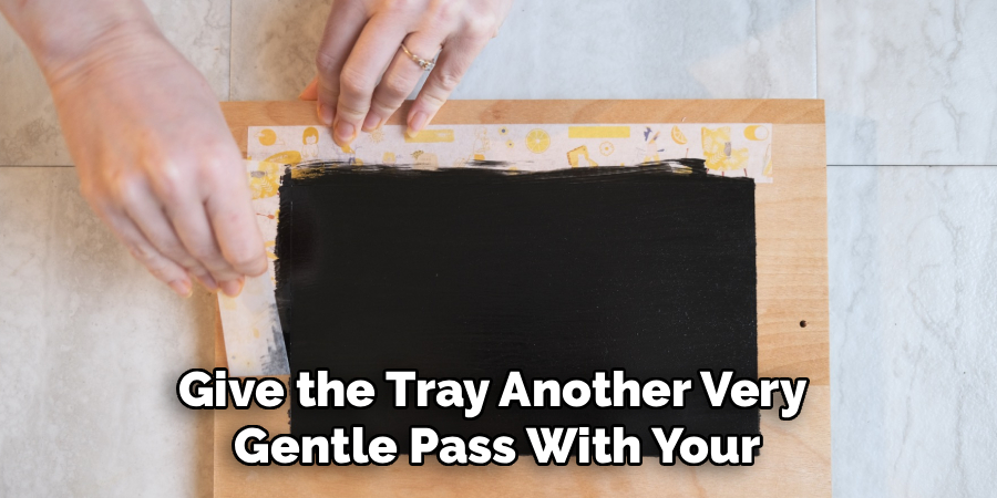 Give the Tray Another Very
Gentle Pass With Your