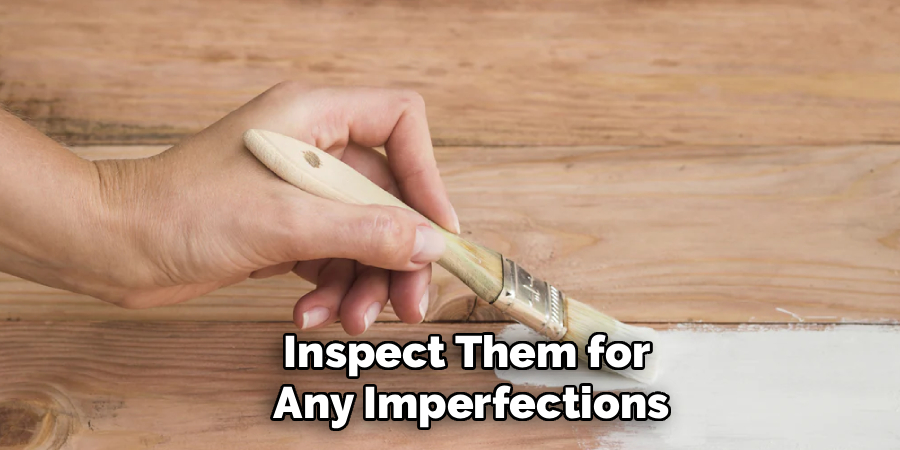 Inspect Them for
 Any Imperfections