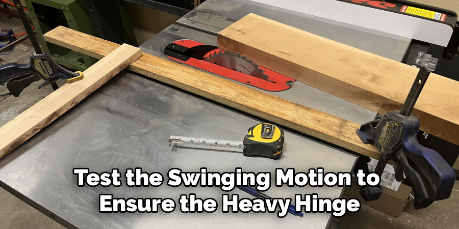 Test the Swinging Motion to 
Ensure the Heavy Hinge