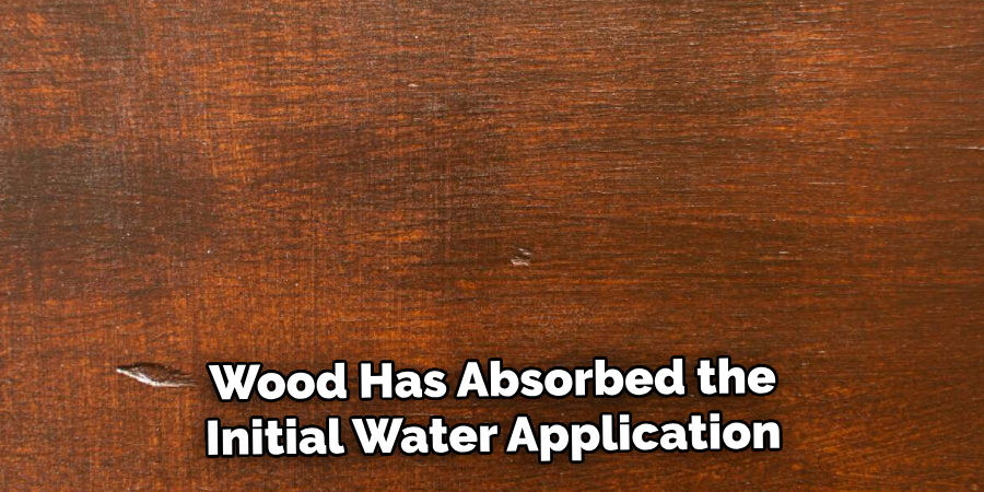 Wood Has Absorbed the
Initial Water Application