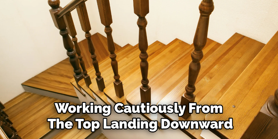 Working Cautiously From 
The Top Landing Downward